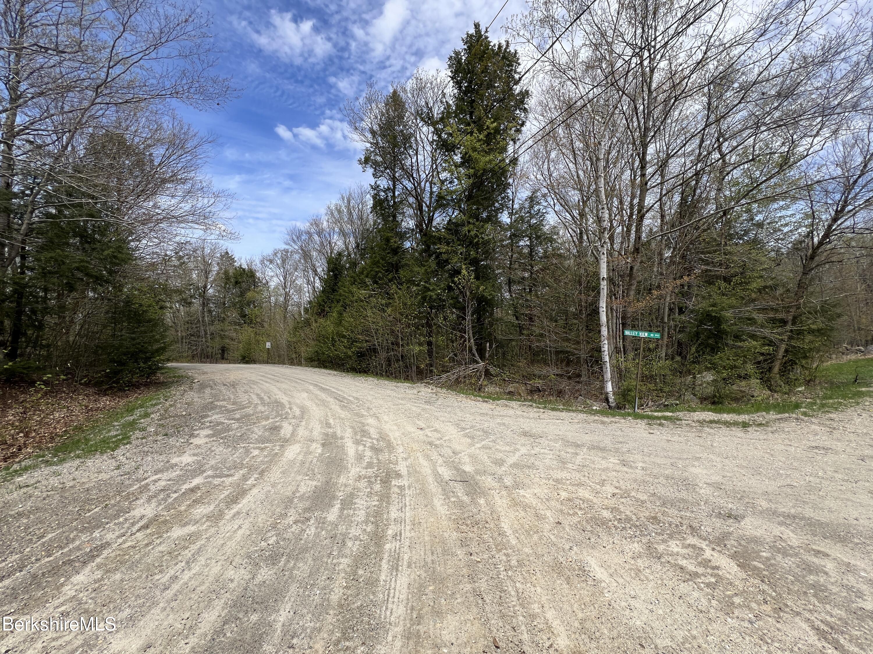 Lot32 Valley View Road Becket, MA 01223 - Photo 2 of 7 a backyard of a house with lots of green space