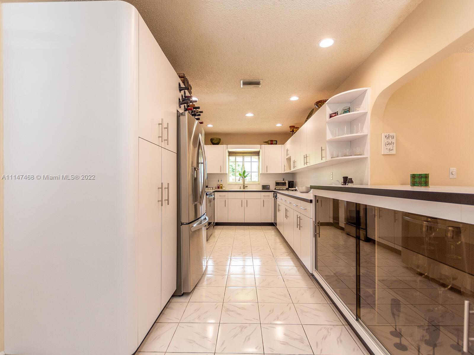 490 West 33rd Place Hialeah, FL 33012 - Photo 23 of 88 a view of a kitchen with kitchen and a window