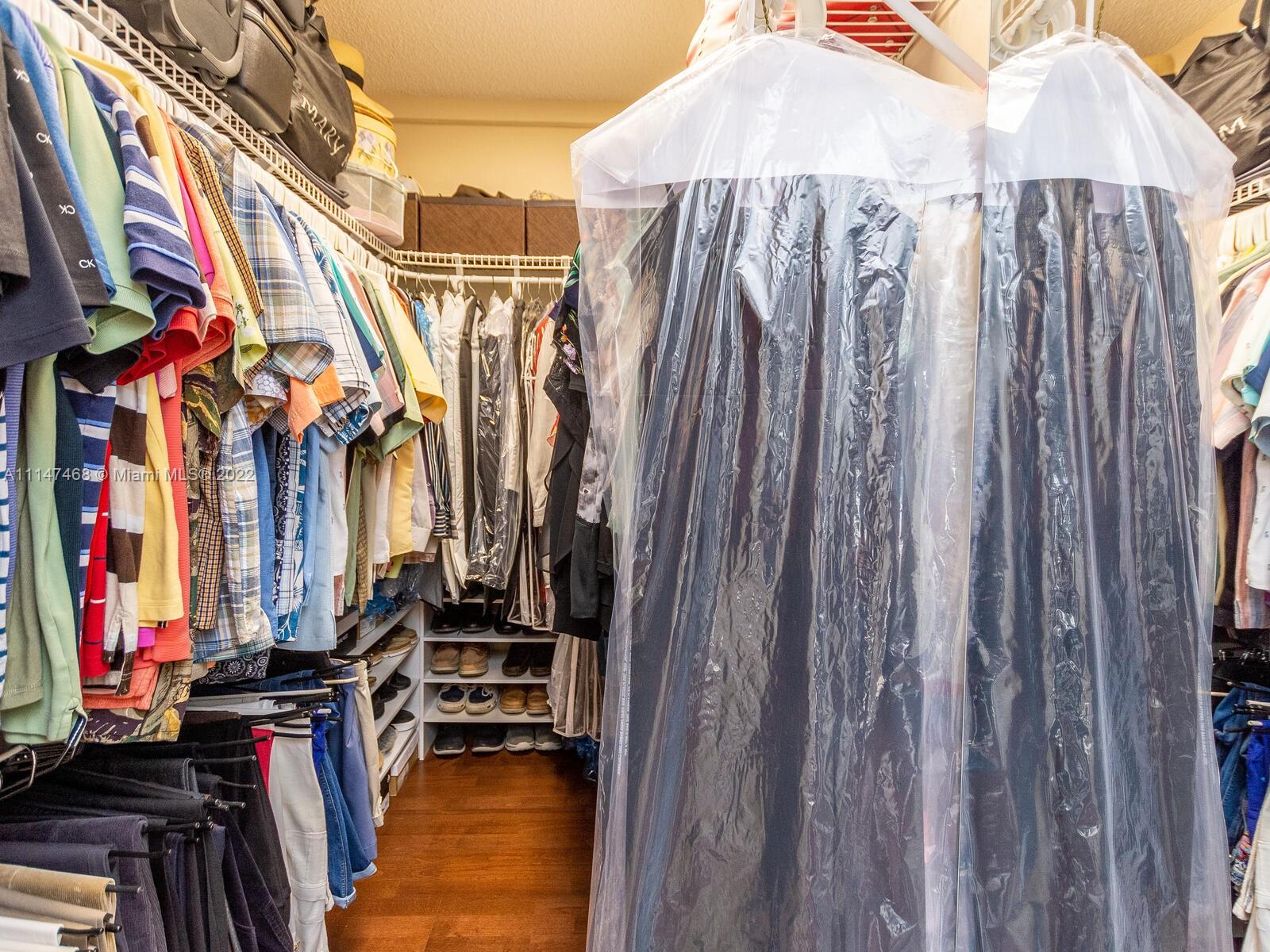 490 West 33rd Place Hialeah, FL 33012 - Photo 47 of 88 a view of walk in closet with clothes