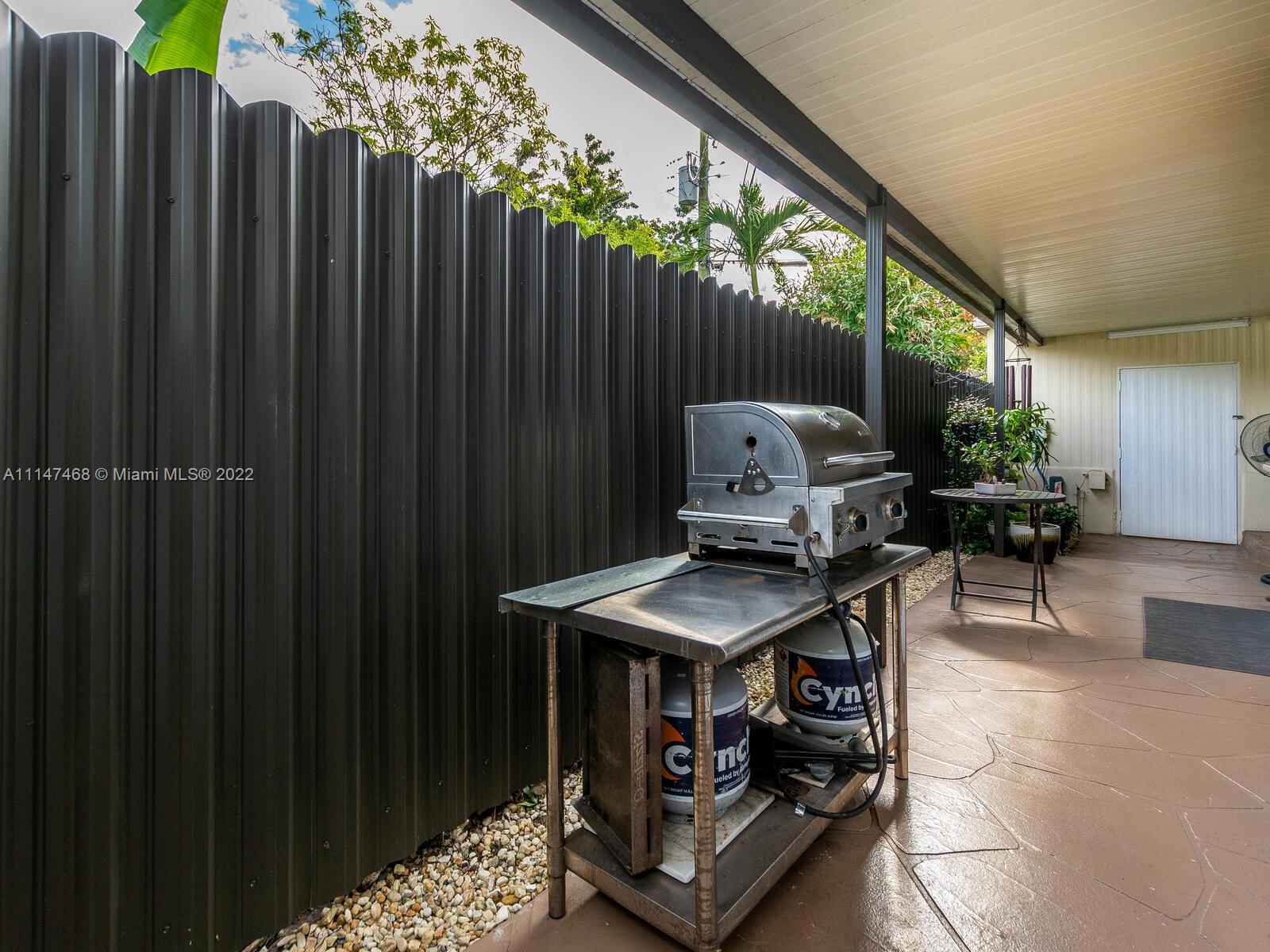 490 West 33rd Place Hialeah, FL 33012 - Photo 79 of 88 a view of outdoor space with seating area