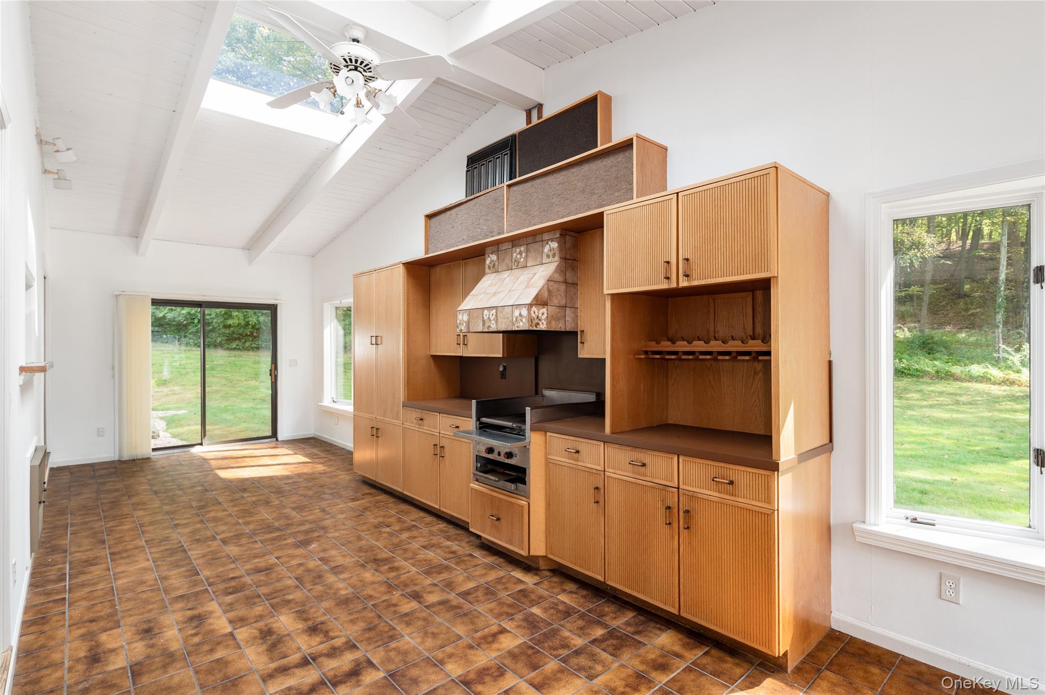 28 Alice Road Mount Kisco, NY 10549 - Photo 12 of 32 a kitchen with cabinets and window