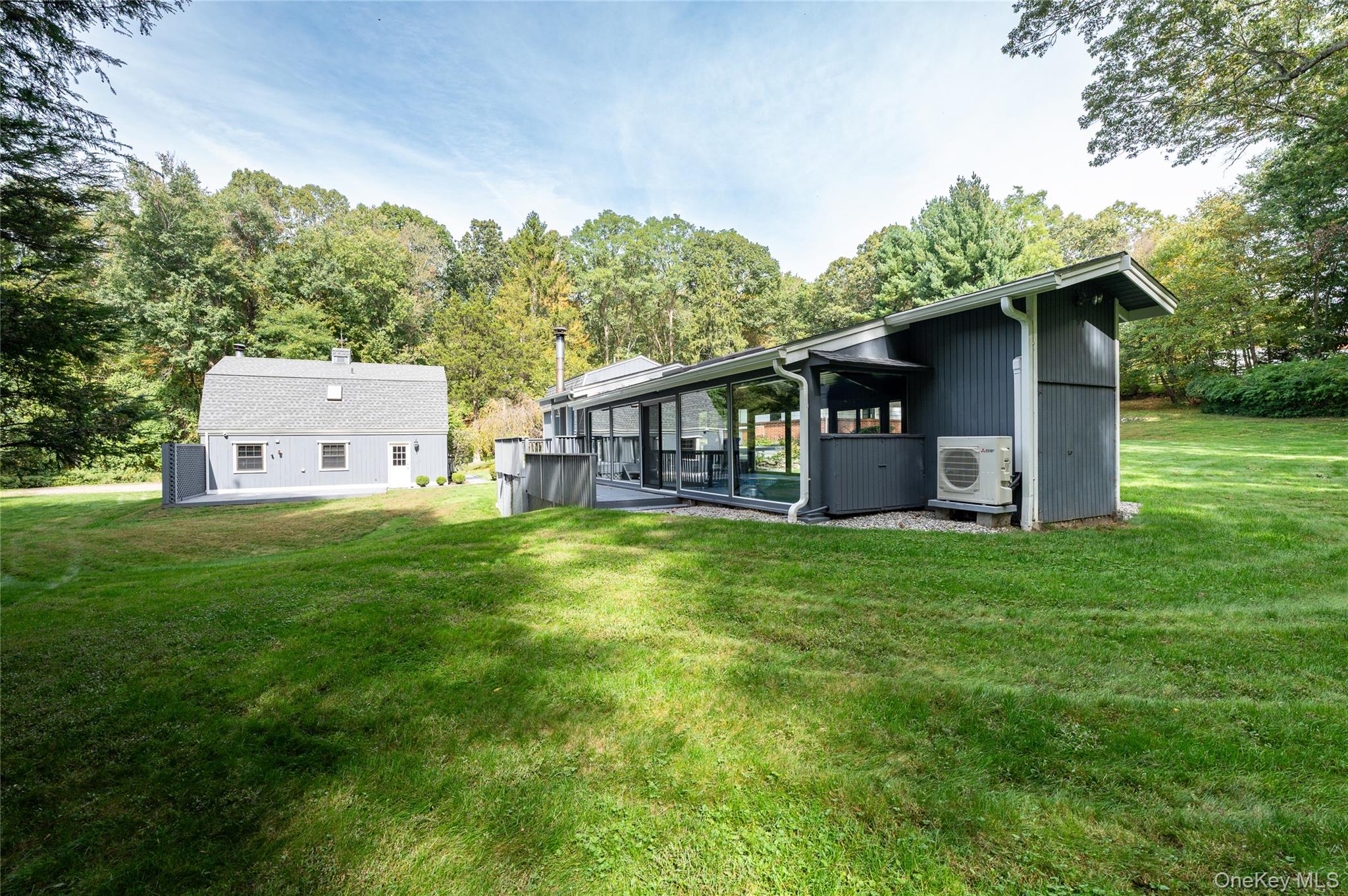 28 Alice Road Mount Kisco, NY 10549 - Photo 24 of 32 a view of a house with backyard and garden