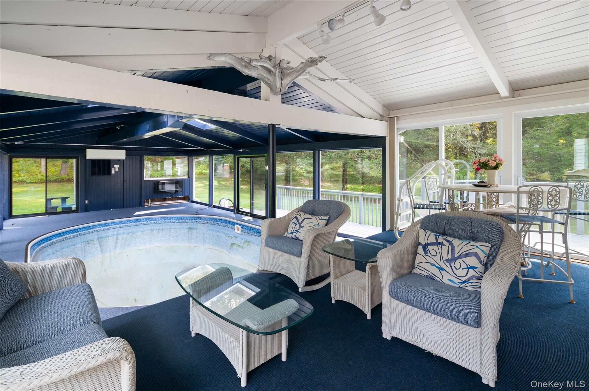 28 Alice Road Mount Kisco, NY 10549 - Photo 25 of 32 a living room with furniture and a large window