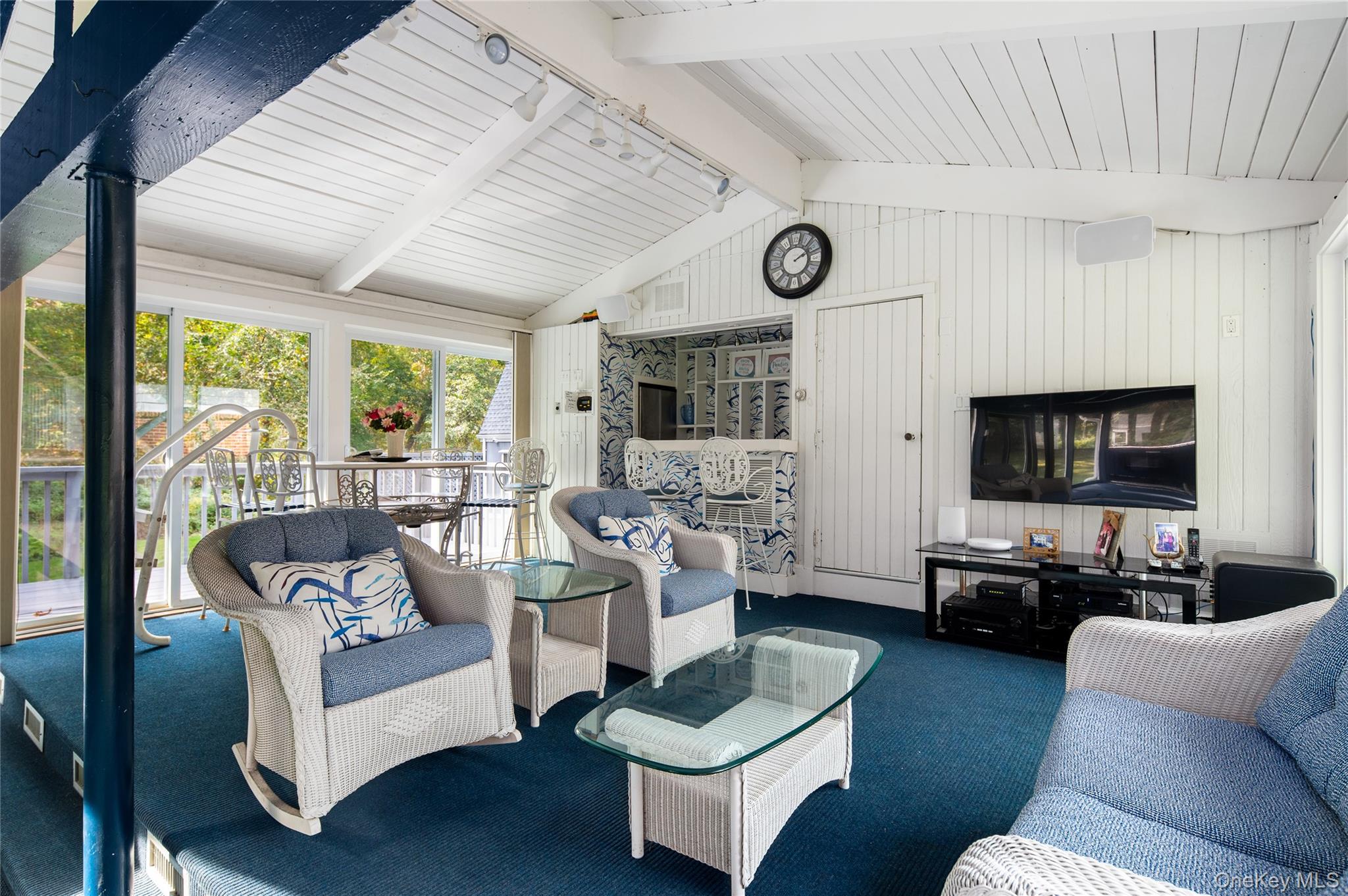 28 Alice Road Mount Kisco, NY 10549 - Photo 26 of 32 a living room with furniture and a flat screen tv