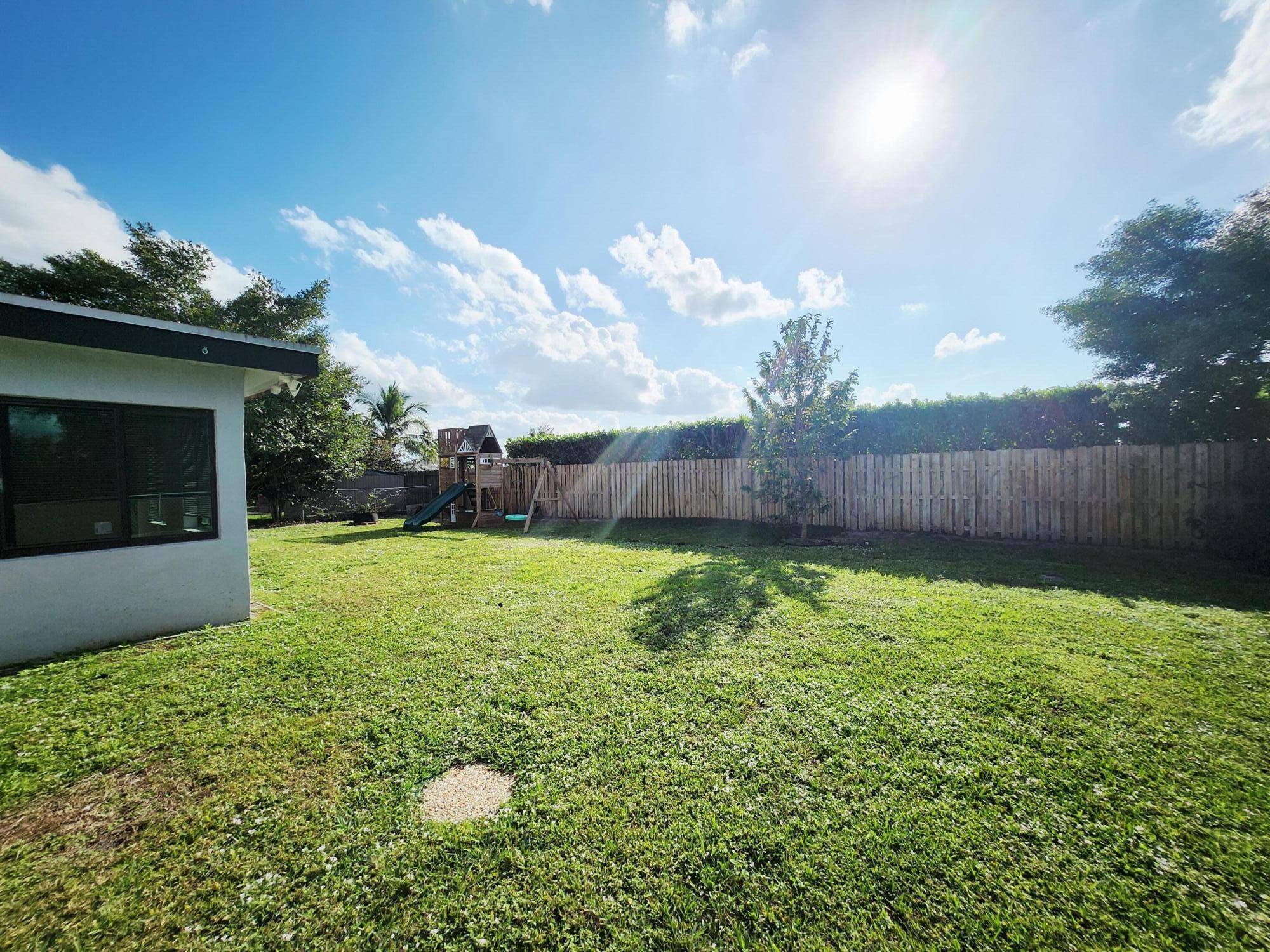 19471 Colorado Circle Boca Raton, FL 33434 - Photo 16 of 22 a view of a backyard