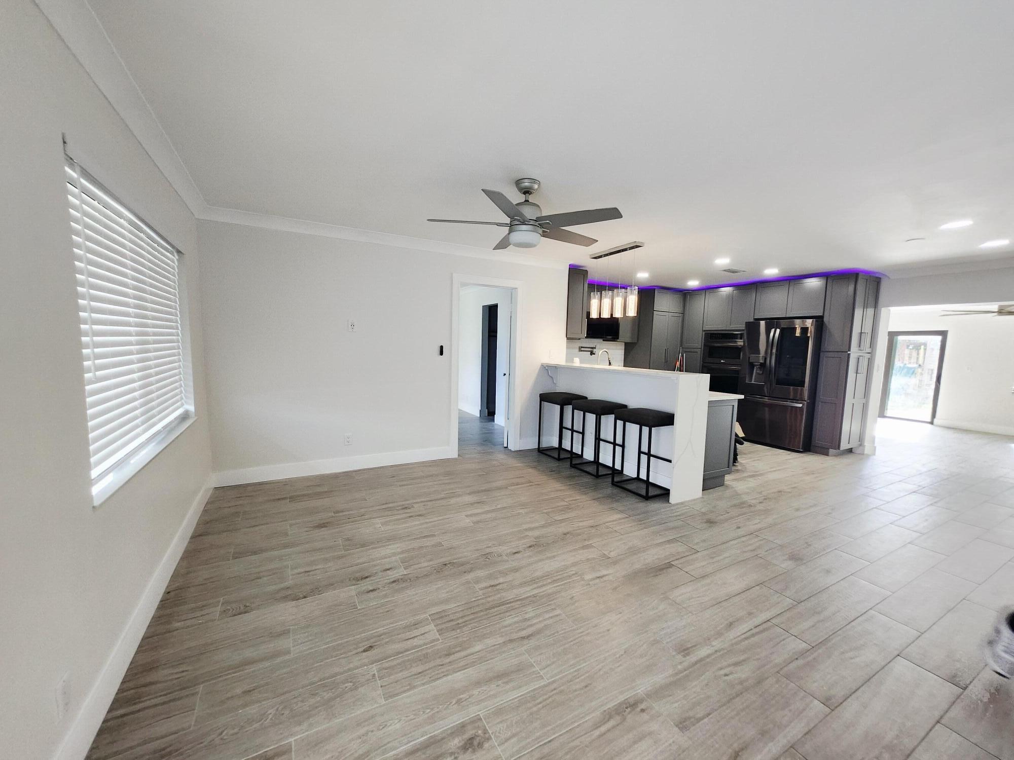 19471 Colorado Circle Boca Raton, FL 33434 - Photo 3 of 22 a view of a kitchen with a sink and a window