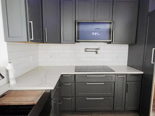 a view of cabinets with wooden cabinets