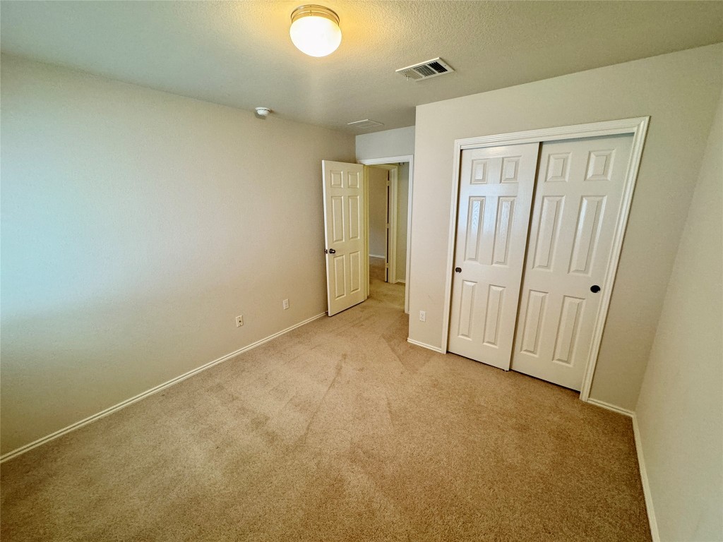 2209 Christoff Loop Austin, TX 78748 - Photo 15 of 25 an empty room with windows