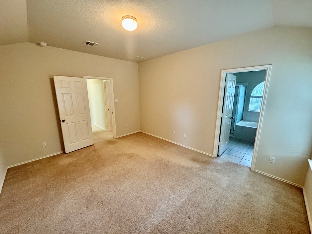 2209 Christoff Loop Austin, TX 78748 - Photo 17 of 25 an empty room with a bathroom