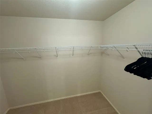 a view of a garden with a porch