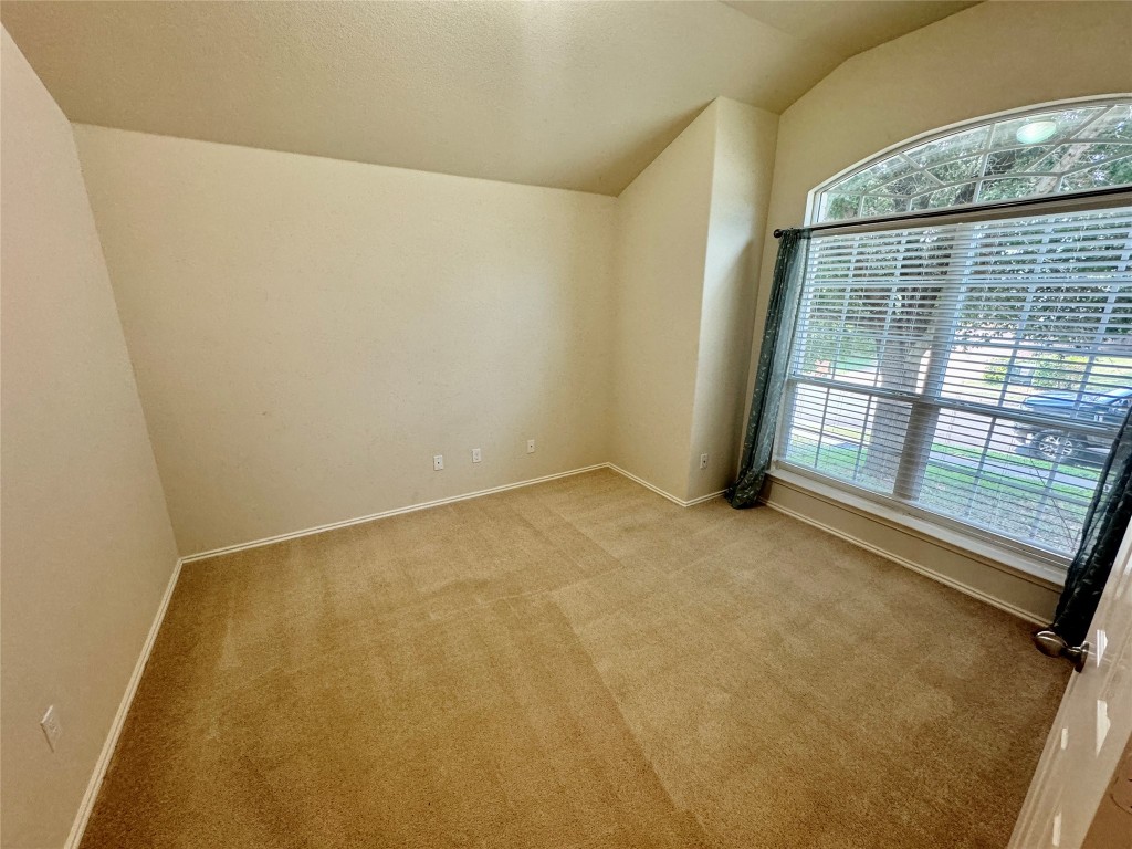 2209 Christoff Loop Austin, TX 78748 - Photo 3 of 25 a view of an empty room with a window