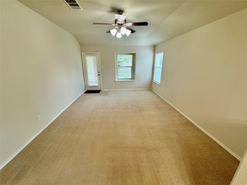 2209 Christoff Loop Austin, TX 78748 - Photo 8 of 25 a view of an empty room with a window