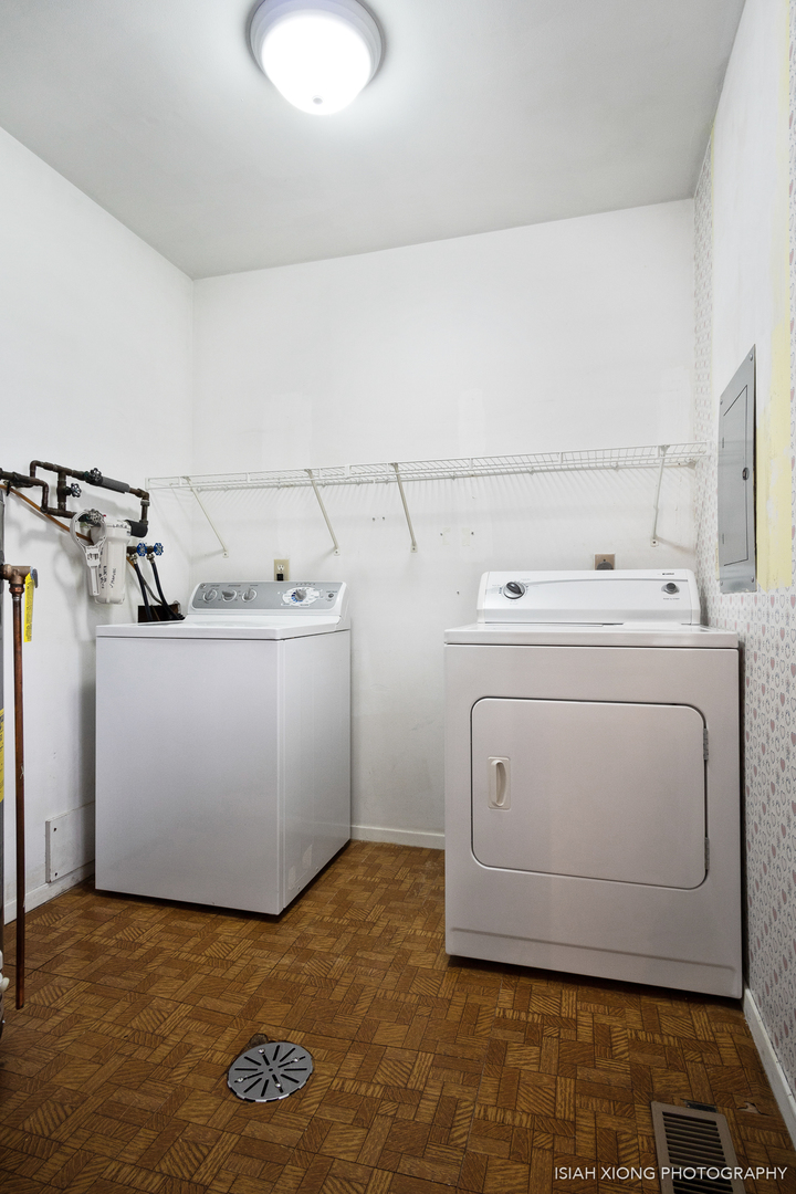 107 Long Beach Road Montgomery, IL 60538 - Photo 12 of 26 a utility room with dryer and washer