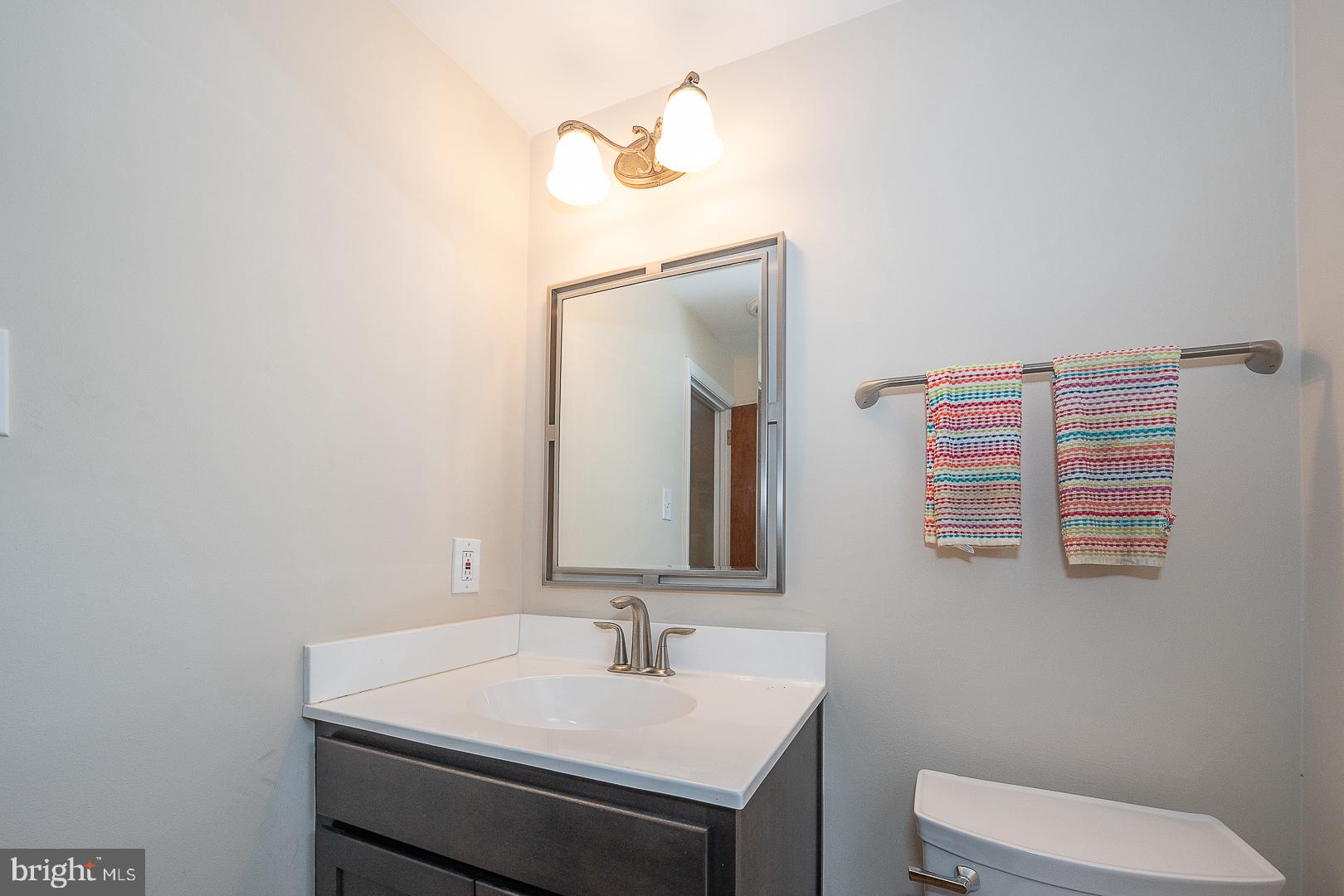 20 Fairview Road Swarthmore, PA 19081 - Photo 45 of 57 a bathroom with a sink and a mirror