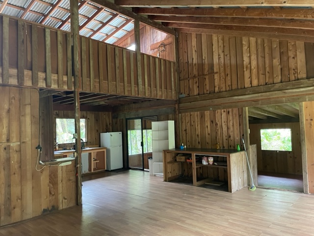 a view of kitchen with furniture and window