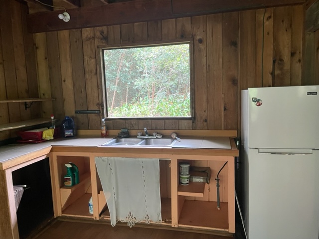 14-4792 Sadileck Road Pahoa, HI 96778 - Photo 12 of 30 a utility room with dryer and washer