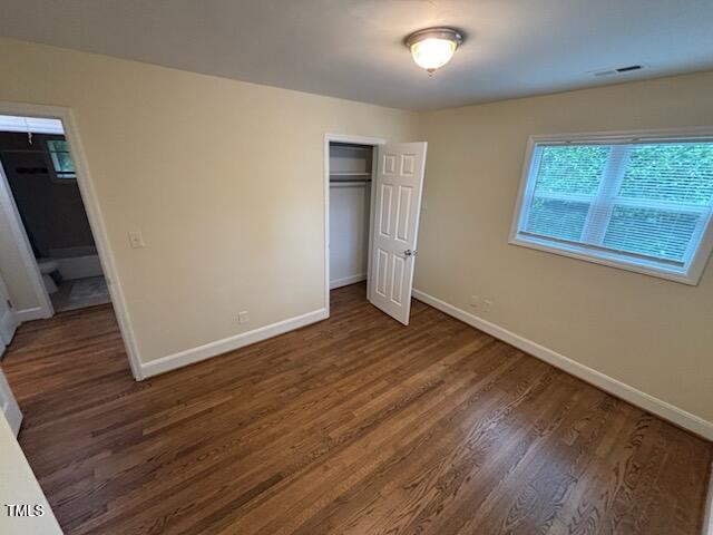 101 Newell Street Durham, NC 27705 - Photo 16 of 29 a view of an empty room with wooden floor and a window