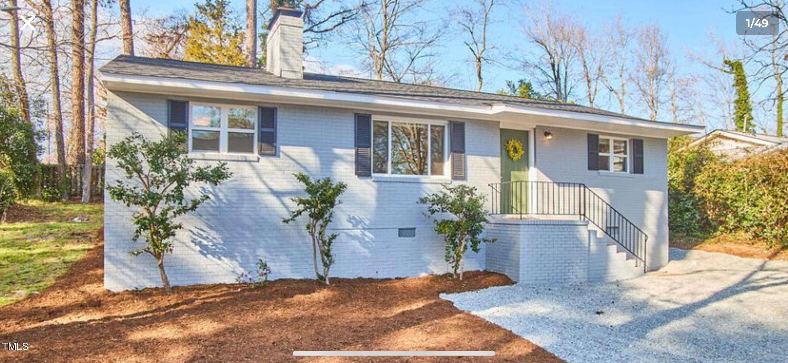 101 Newell Street Durham, NC 27705 - Photo 27 of 29 a view of a house with potted plants