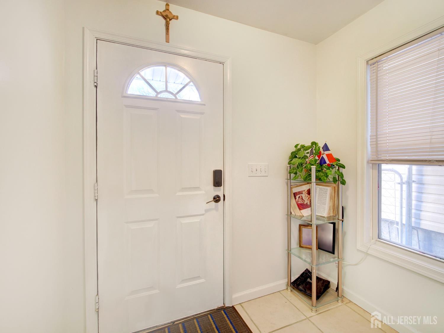 267 Watson Avenue Perth Amboy, NJ 08861 - Photo 12 of 24 a view of an entryway with wooden floor