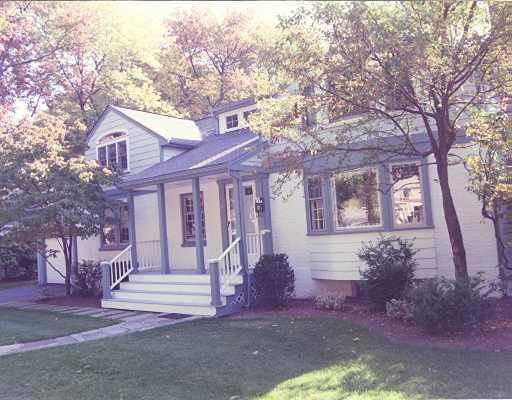 25 Gordon Road Newton, MA 02468 - Photo 1 of 1 a front view of a house with a yard