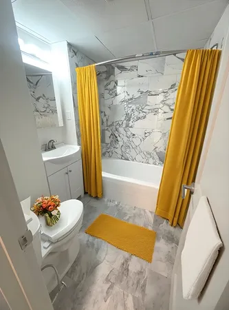 a bathroom with a sink and a bathtub