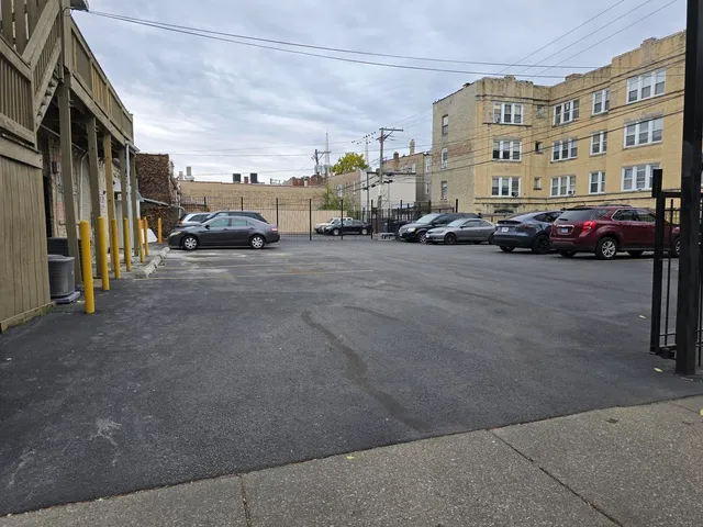 a view of a street with cars
