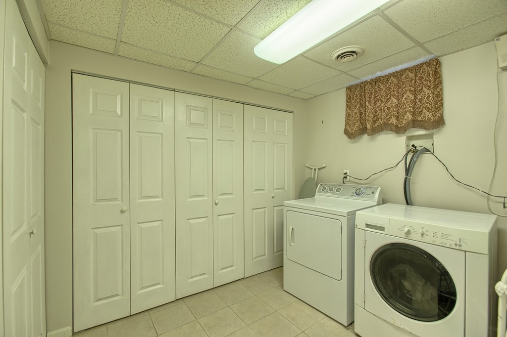 86 Acropolis Road Lowell, MA 01854 - Photo 23 of 30 a utility room with dryer and washer