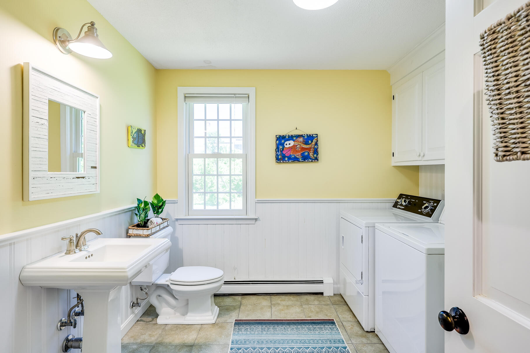 28 Sand Bar Lane Brewster, MA 02631 - Photo 26 of 74 a bathroom with a sink a toilet and window