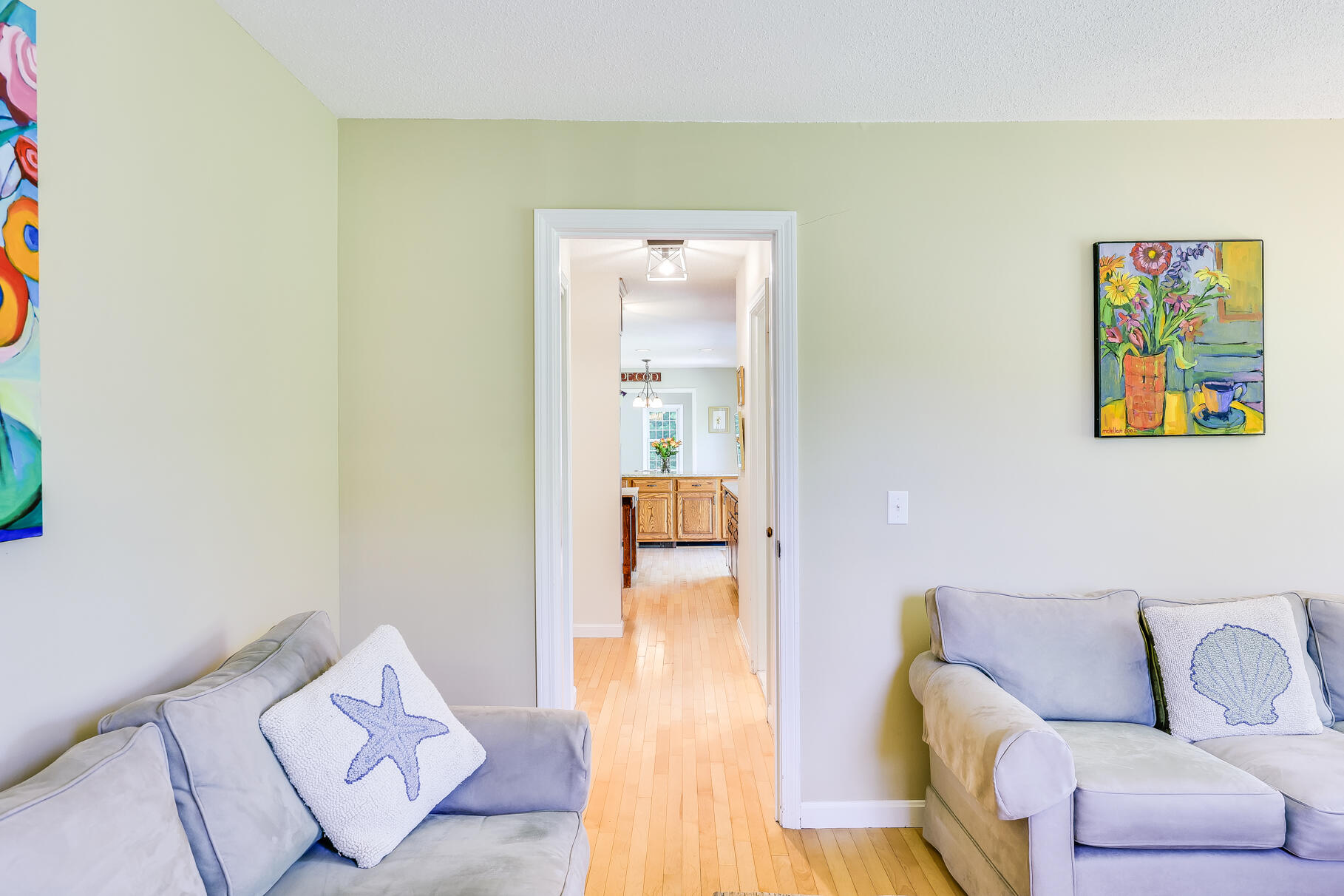 28 Sand Bar Lane Brewster, MA 02631 - Photo 29 of 74 a living room with furniture and a couch