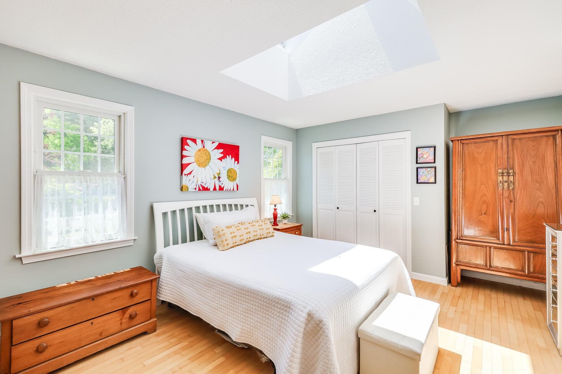 28 Sand Bar Lane Brewster, MA 02631 - Photo 30 of 74 a bedroom with a bed and a large window