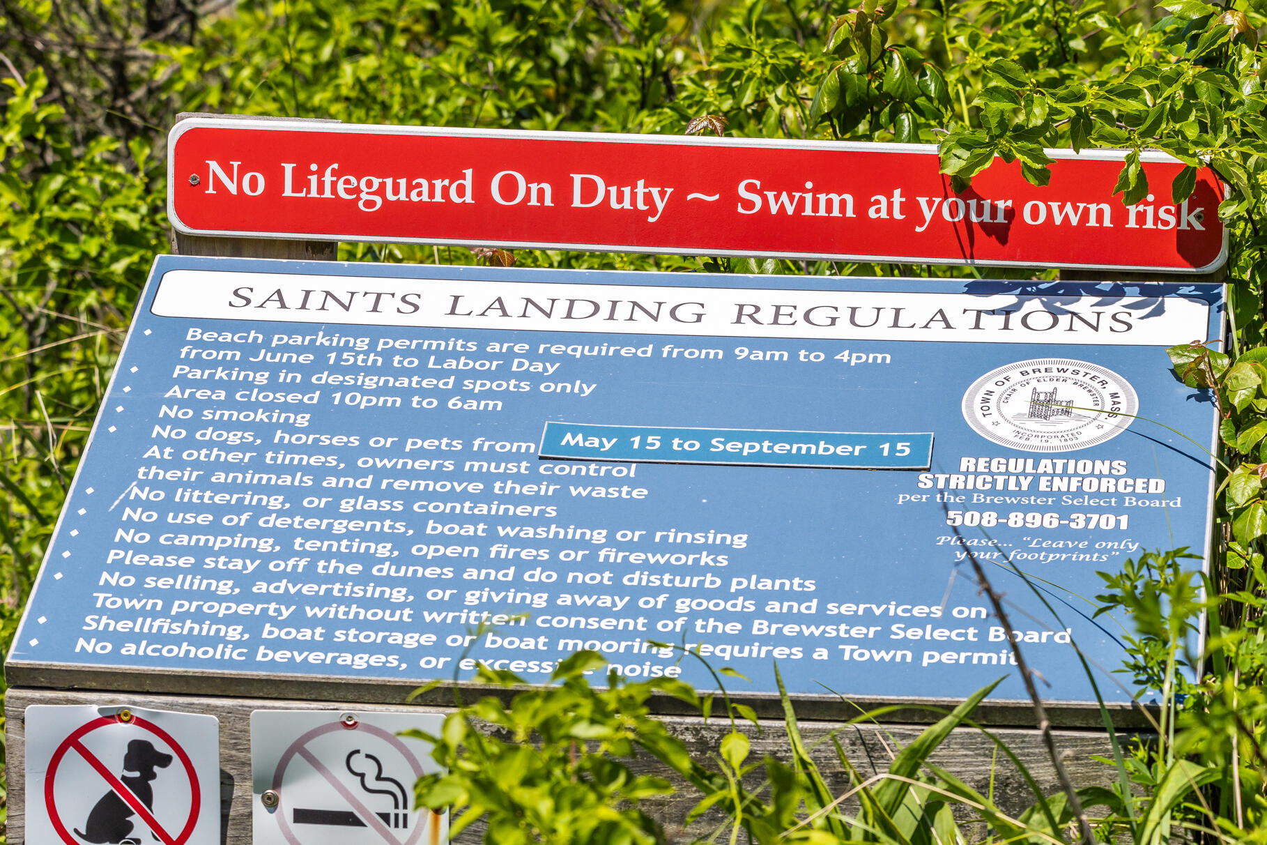 28 Sand Bar Lane Brewster, MA 02631 - Photo 62 of 74 a sign on the wall of a building