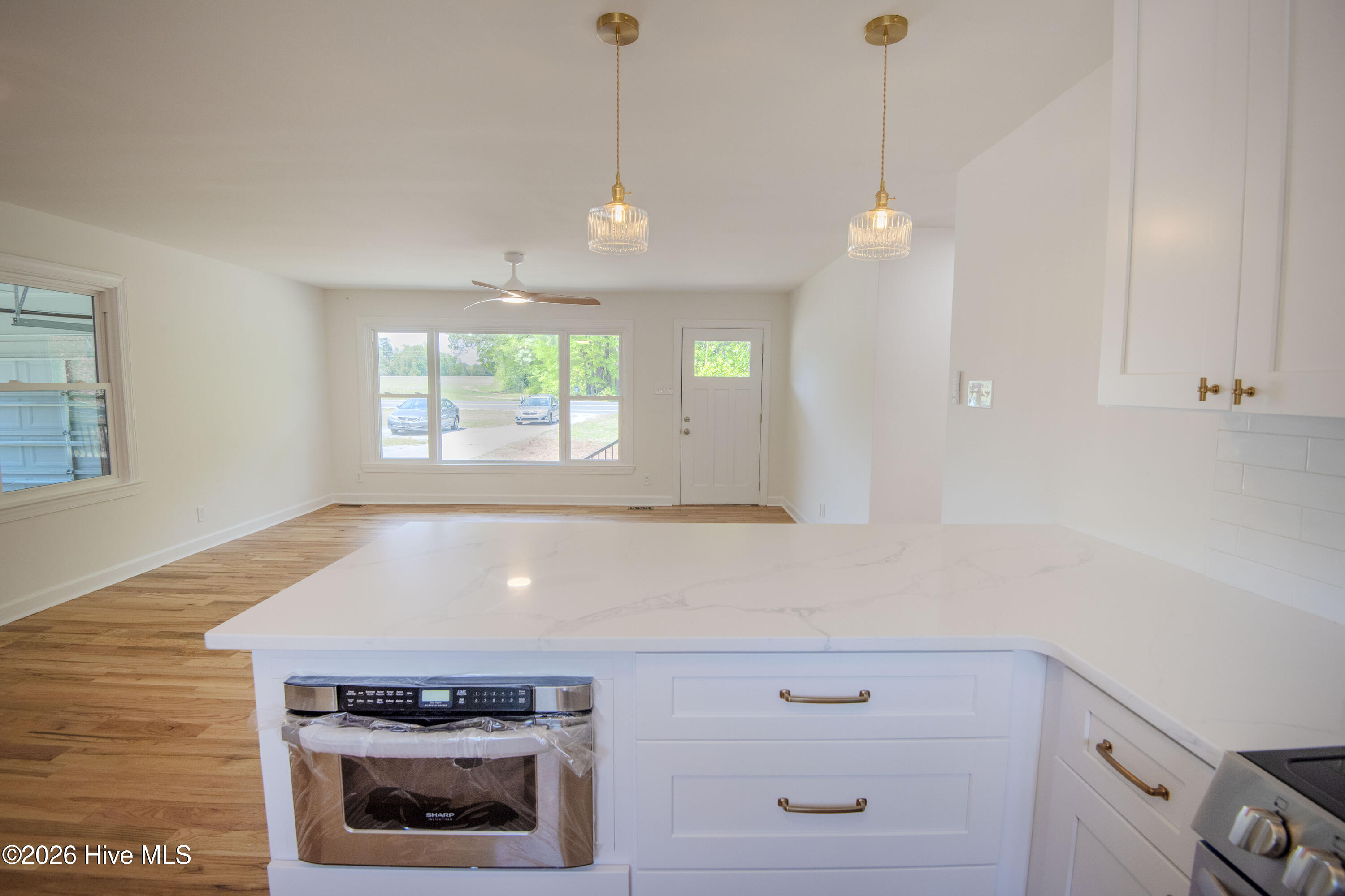 501 Gay Road Zebulon, NC 27597 - Photo 15 of 42 View from kitchen to dining & living room