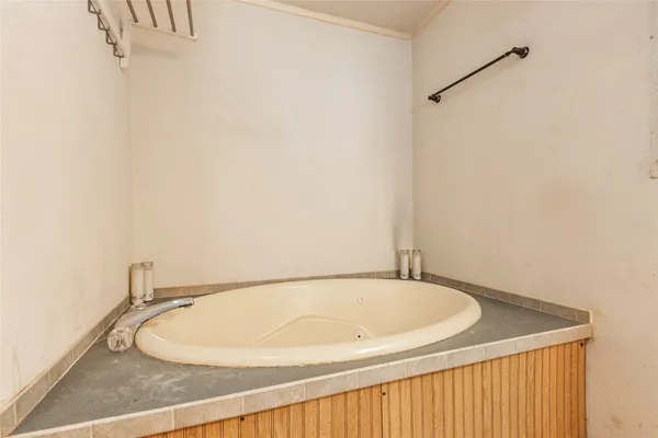 a bathroom with a sink and a bathtub