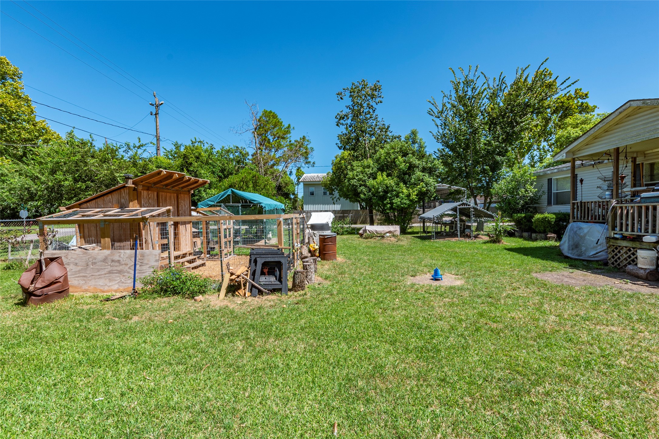 4624 6th Street Bacliff, TX 77518 - Photo 26 of 36 a view of a house with backyard and sitting area