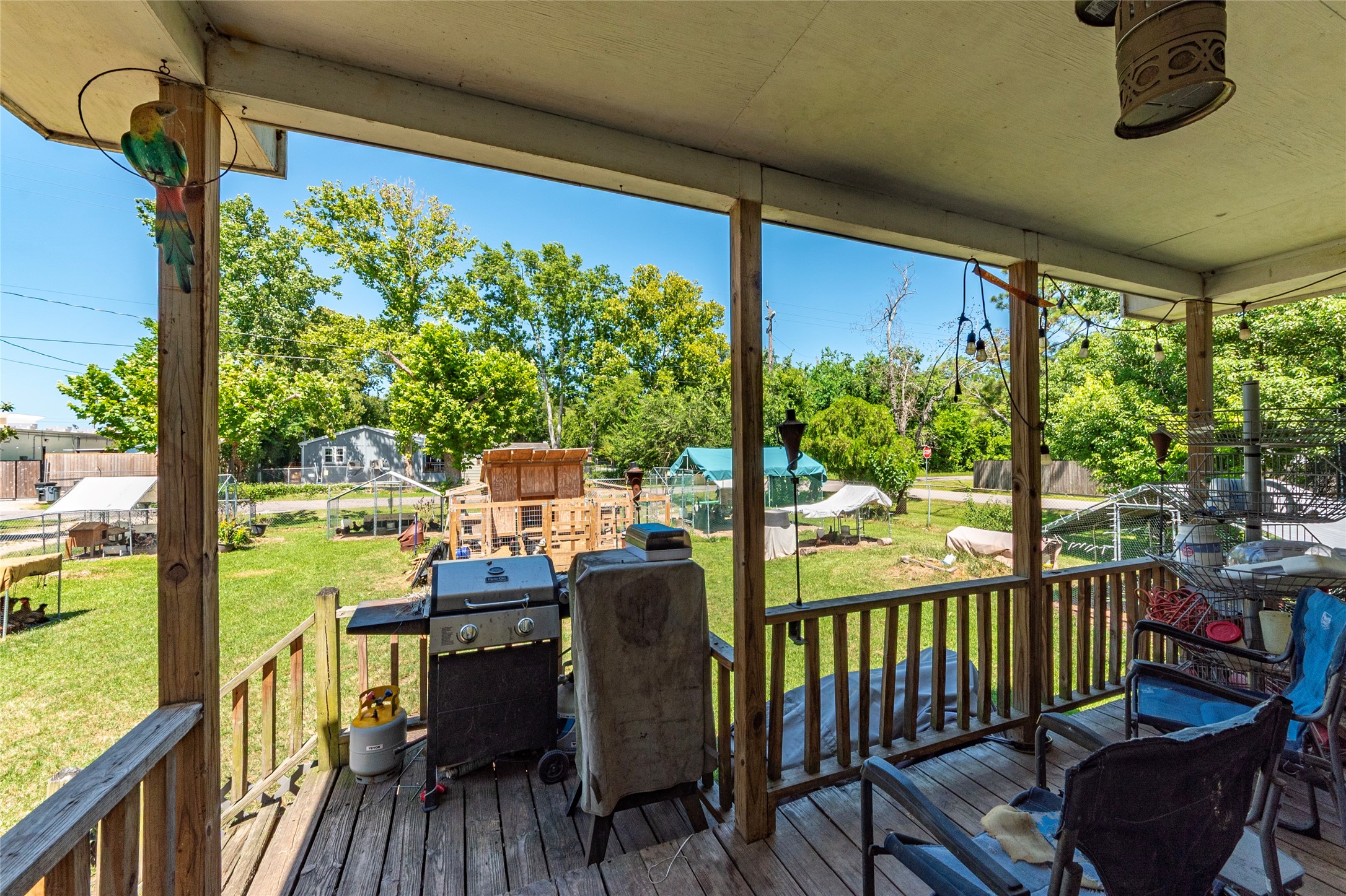 4624 6th Street Bacliff, TX 77518 - Photo 3 of 36 a view of a chairs and table in patio with potted plants