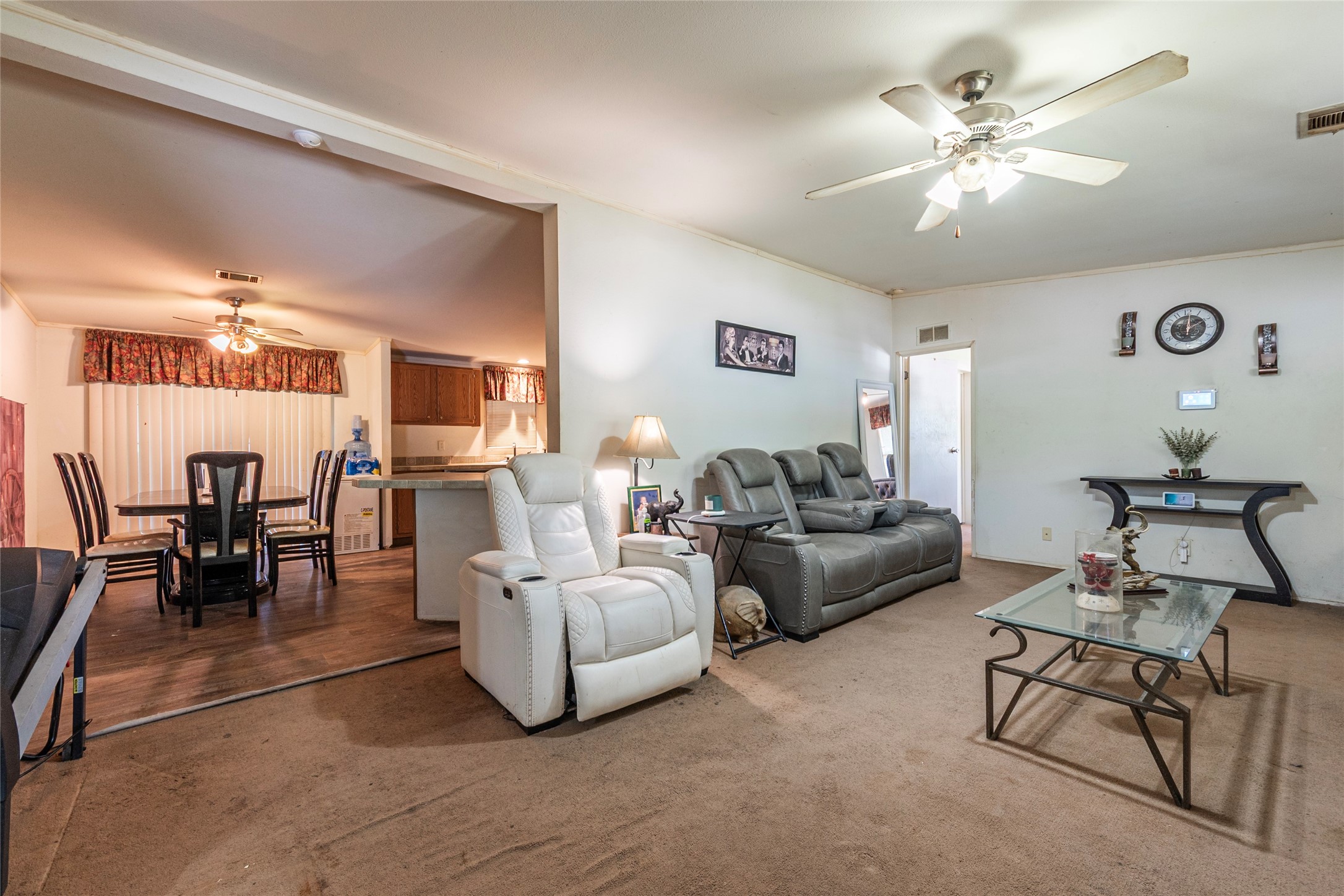4624 6th Street Bacliff, TX 77518 - Photo 8 of 36 a living room with furniture and view of kitchen