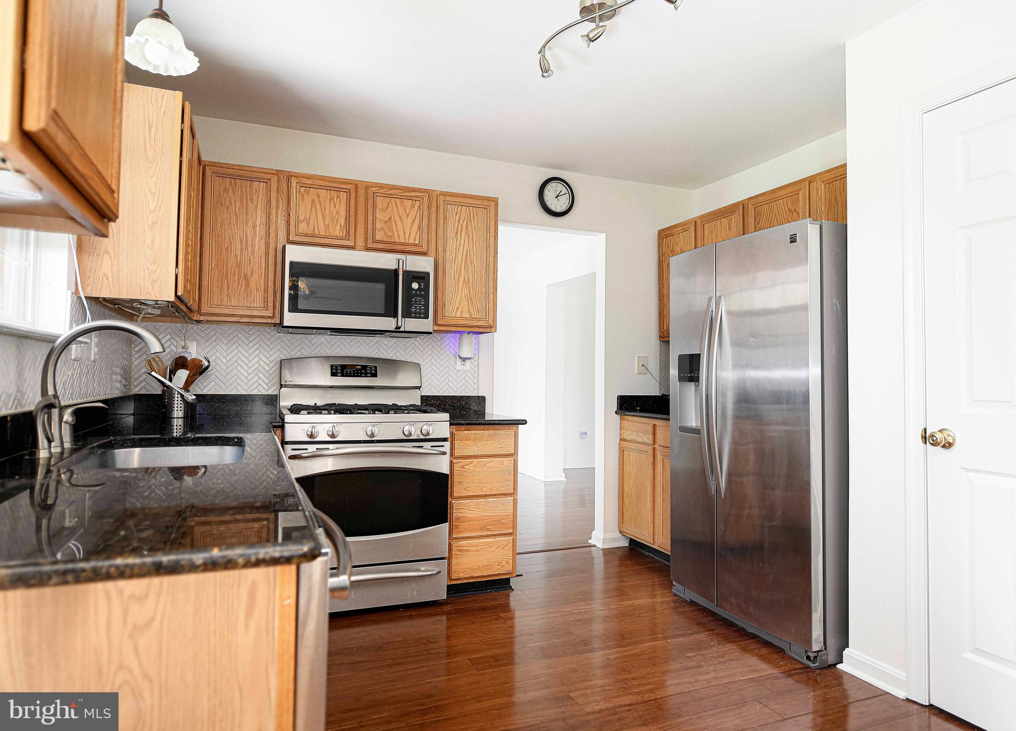 402 Weatherby Road Bel Air, MD 21015 - Photo 17 of 59 Natural wood cabinets & stainless steel appliances