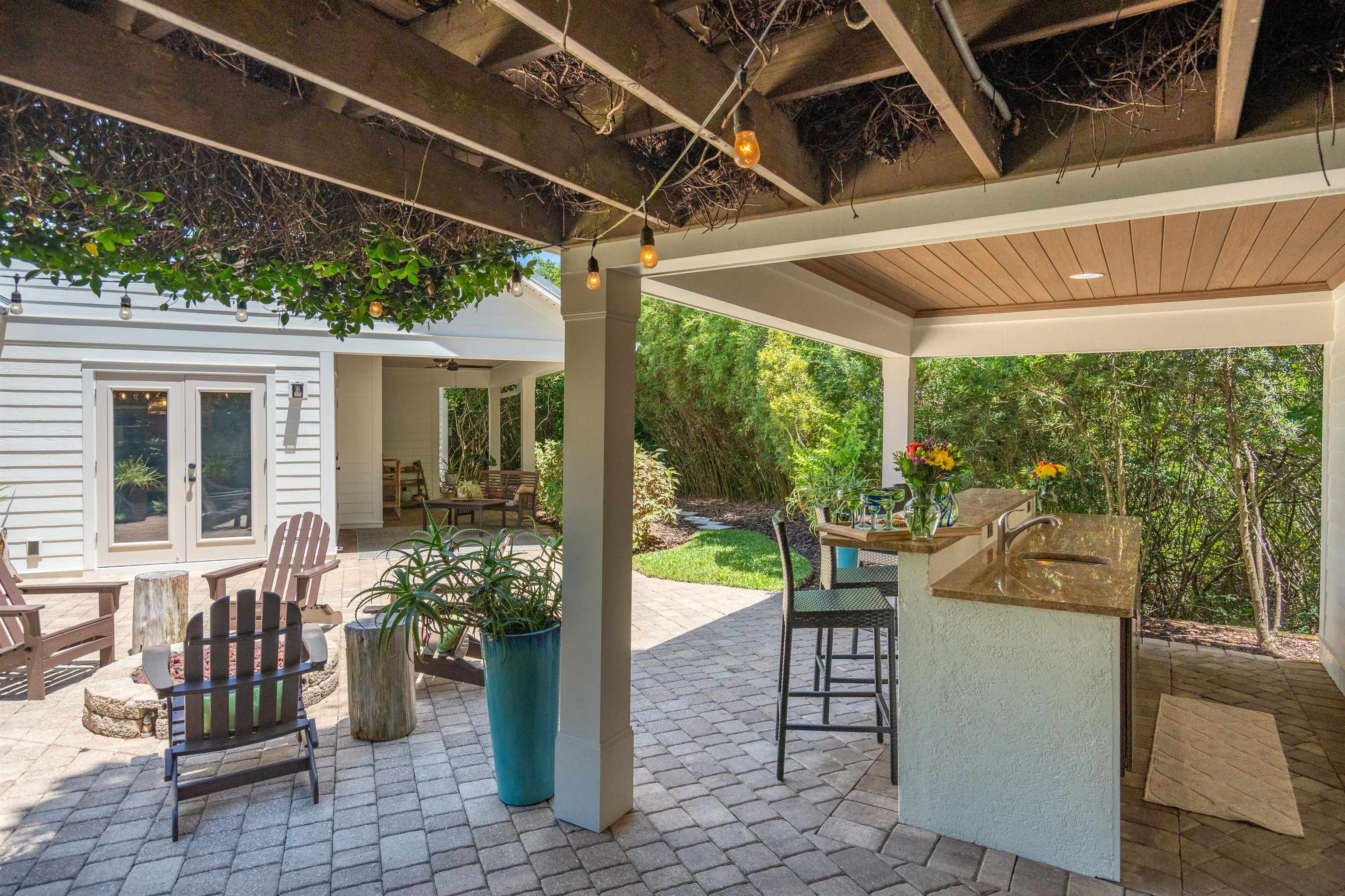 912 Sandy Beach Circle St. Augustine, FL 32080 - Photo 2 of 71 View of patio / terrace with french doors and a bar