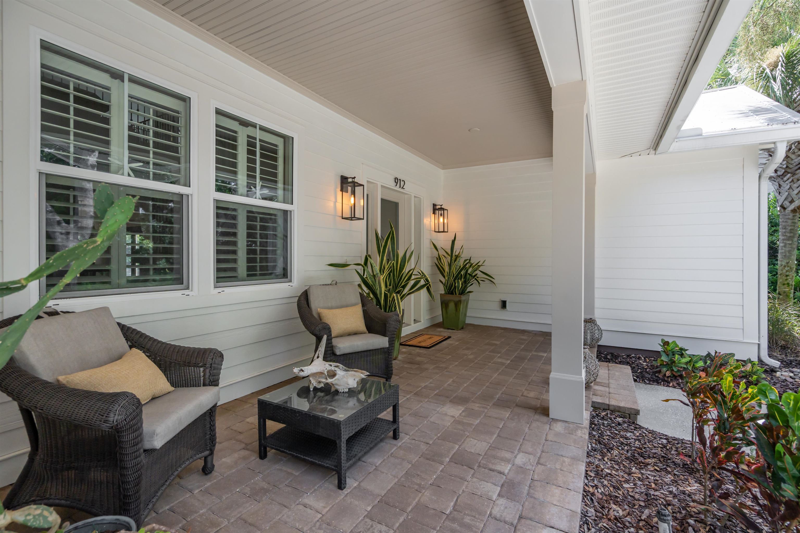 912 Sandy Beach Circle St. Augustine, FL 32080 - Photo 30 of 71 a view of a house with backyard and sitting area
