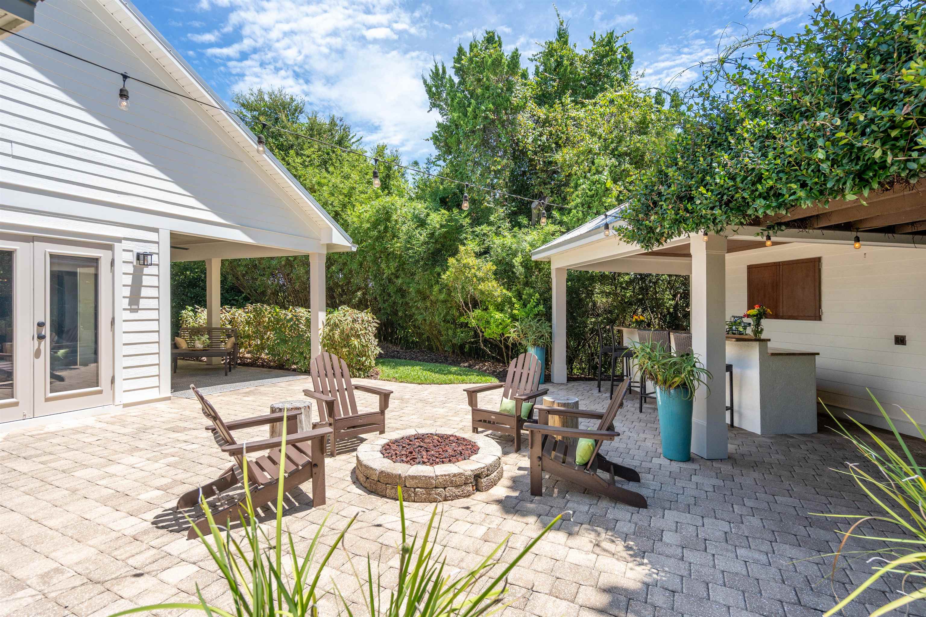 912 Sandy Beach Circle St. Augustine, FL 32080 - Photo 33 of 71 View of patio featuring a fire pit and french doors