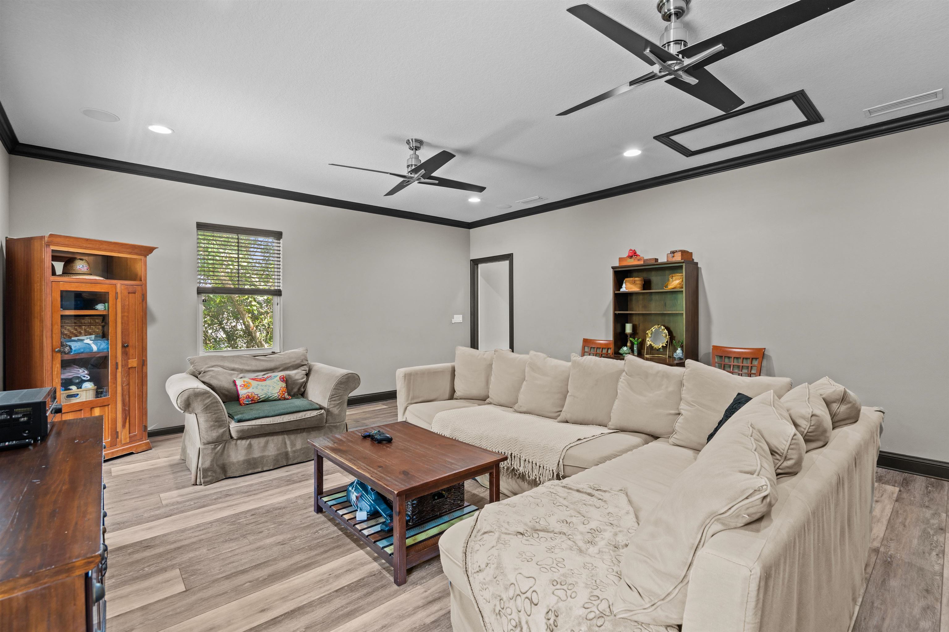912 Sandy Beach Circle St. Augustine, FL 32080 - Photo 50 of 71 Living room with ornamental molding, recessed lighting, light wood finished floors, and ceiling fan