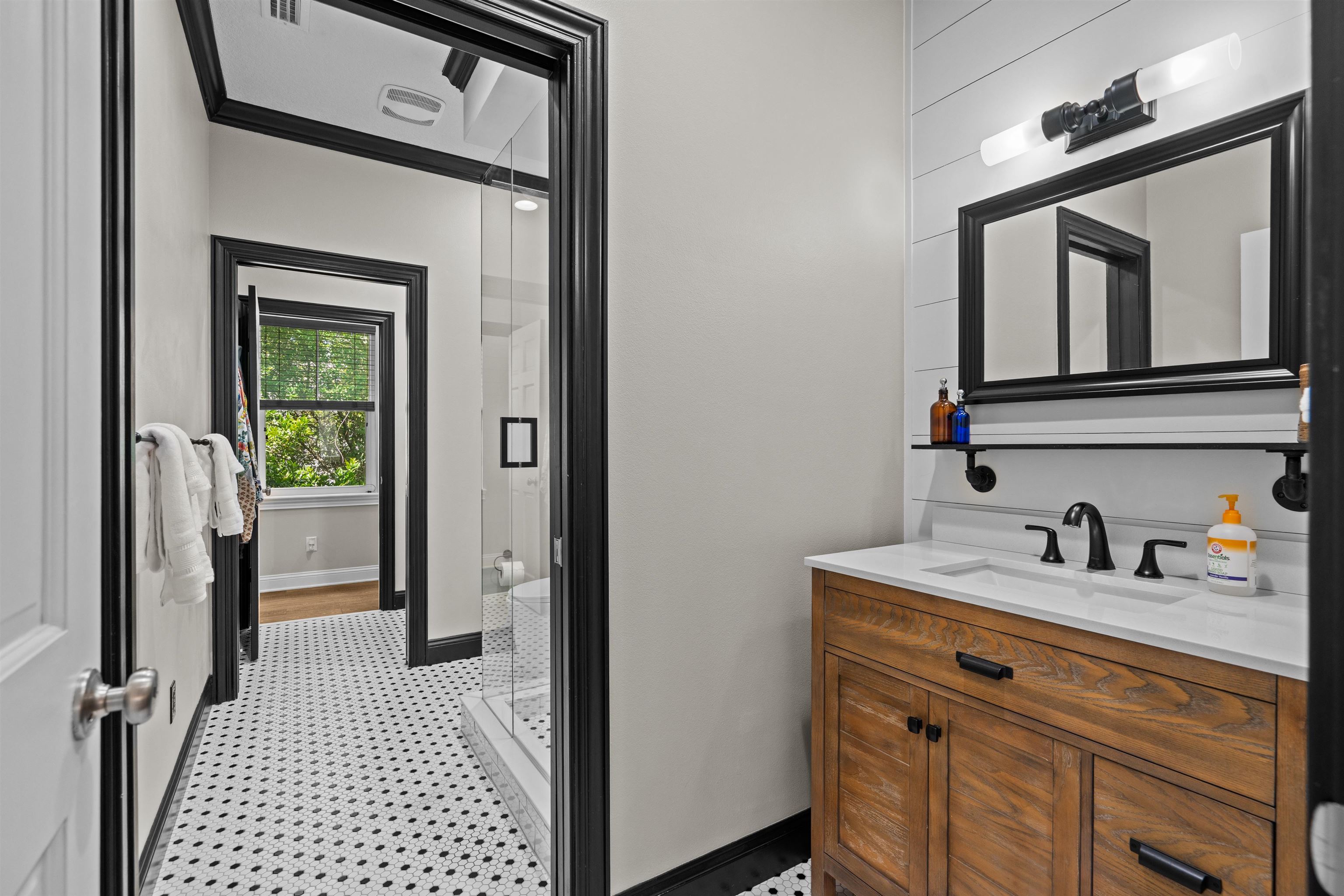 912 Sandy Beach Circle St. Augustine, FL 32080 - Photo 54 of 71 a bathroom with a sink a toilet and a mirror