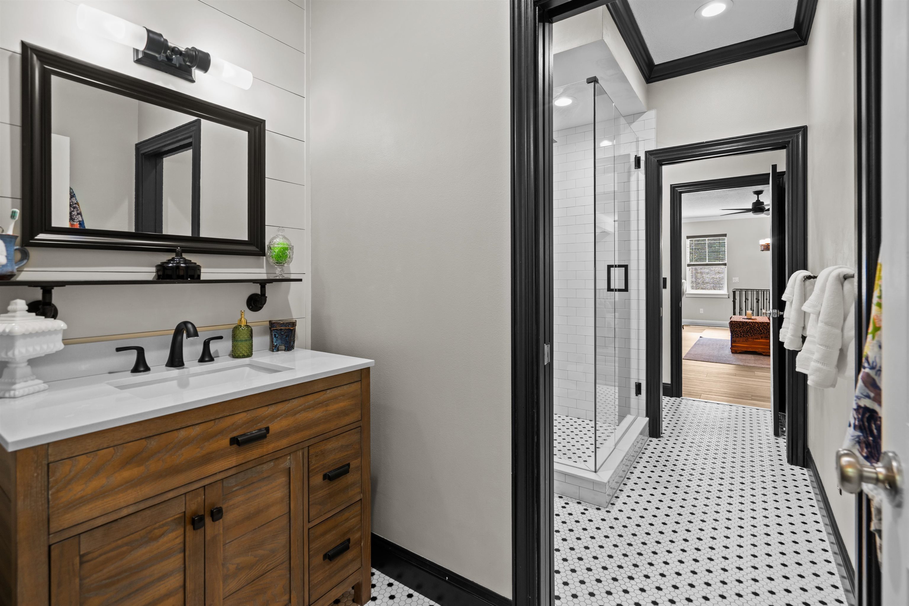 912 Sandy Beach Circle St. Augustine, FL 32080 - Photo 56 of 71 a bathroom with a sink vanity and a mirror