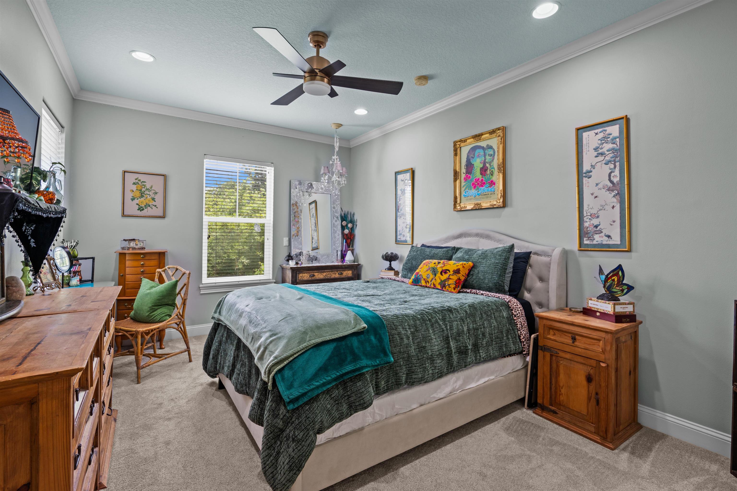 912 Sandy Beach Circle St. Augustine, FL 32080 - Photo 60 of 71 Bedroom with ornamental molding, light carpet, a ceiling fan, recessed lighting, and a textured ceiling