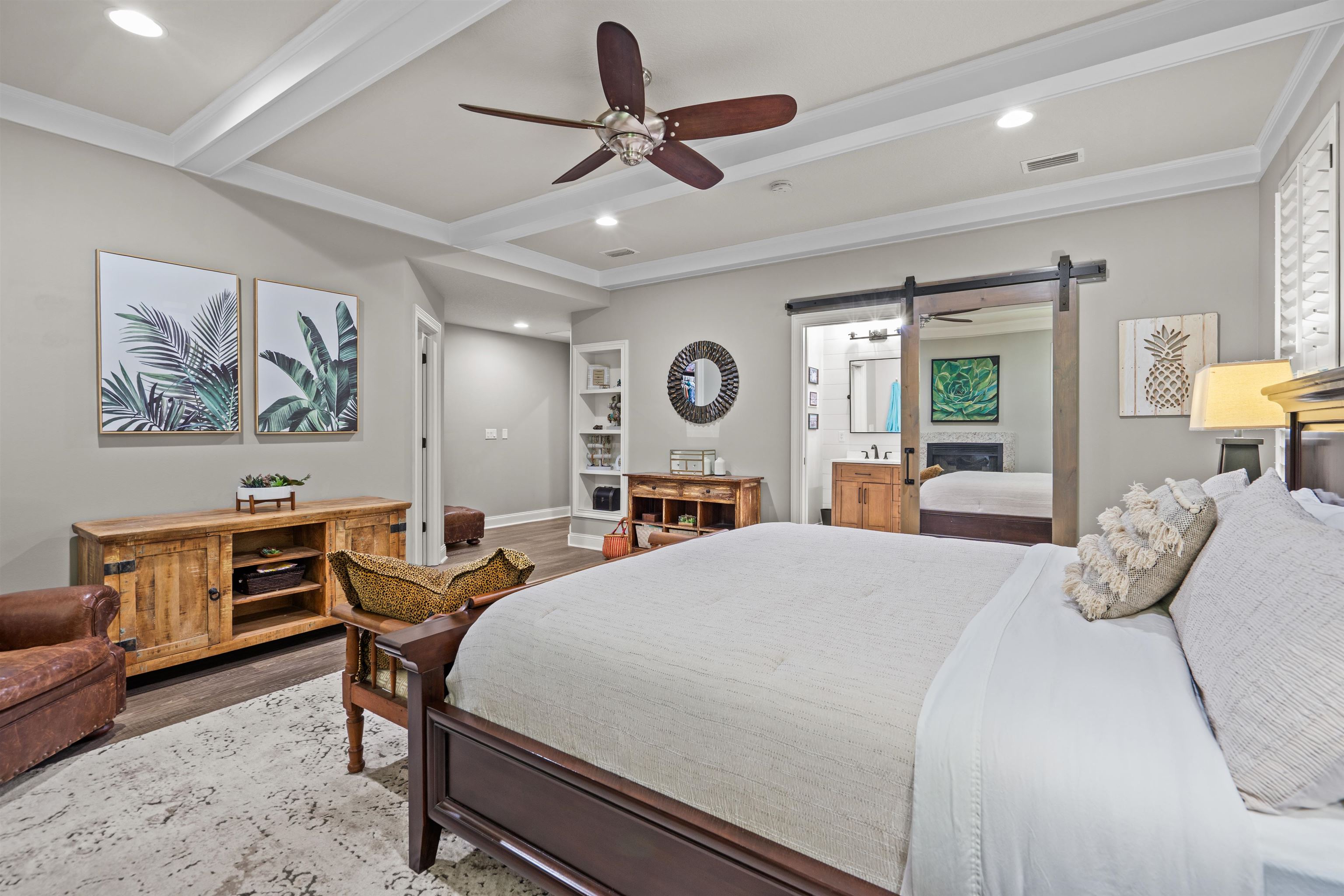 912 Sandy Beach Circle St. Augustine, FL 32080 - Photo 64 of 71 a bedroom with a bed a desk and chair with wooden floor