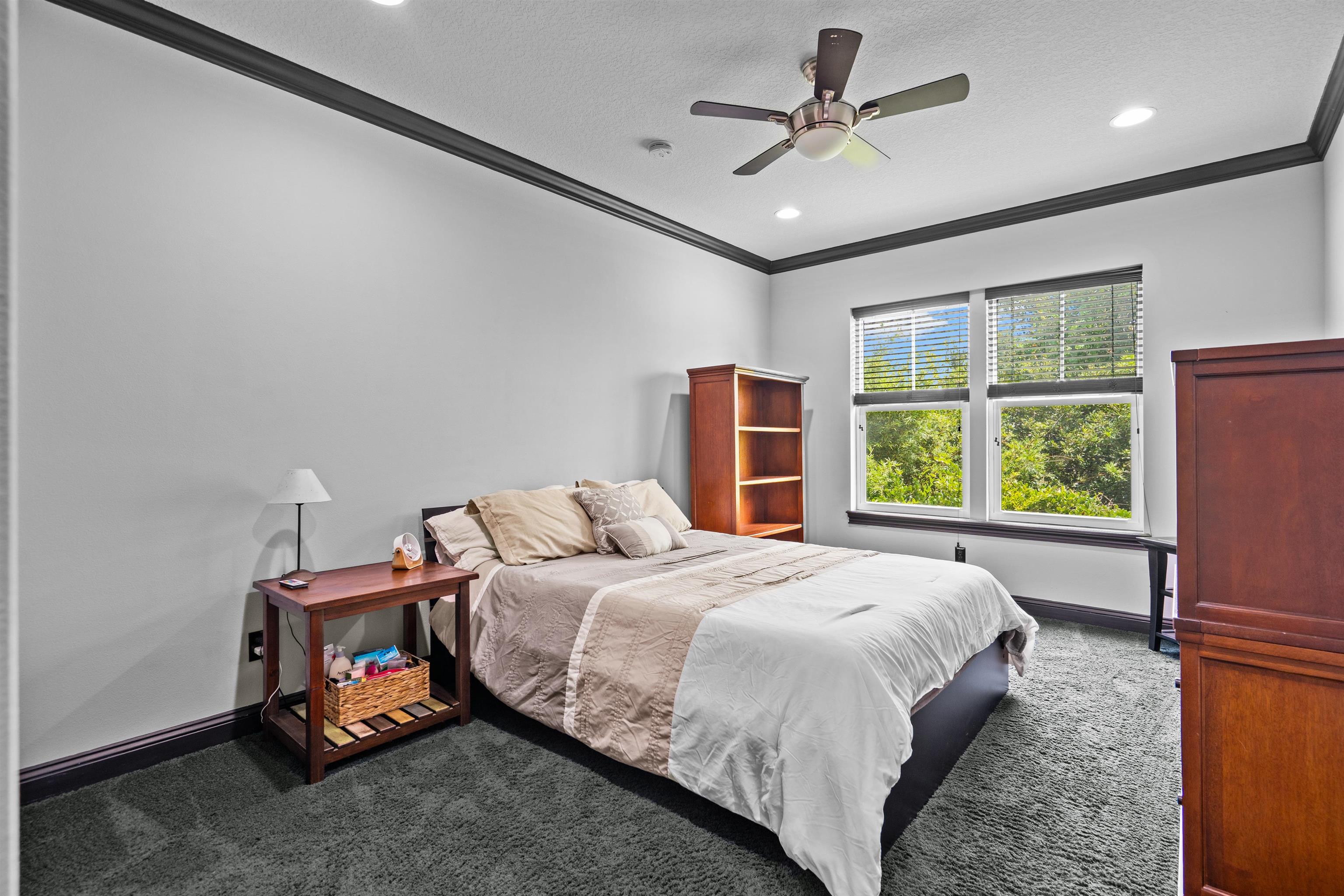 912 Sandy Beach Circle St. Augustine, FL 32080 - Photo 67 of 71 Carpeted bedroom with crown molding, a textured ceiling, recessed lighting, and ceiling fan