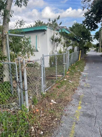 a view of street with houses