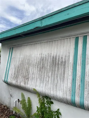 a house view with a backyard