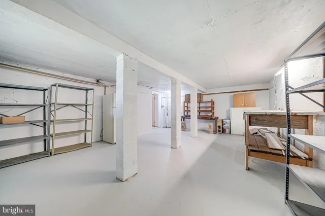 a view of house with backyard outdoor seating and green space