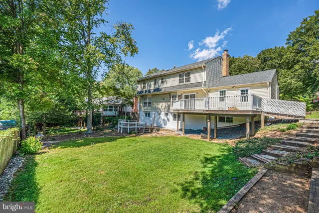 a view of a house with a swimming pool